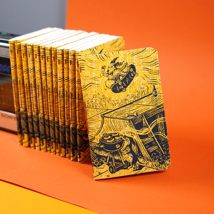 many notebooks standing together featuring dylan goldberger&